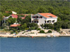 little beach in front of a house